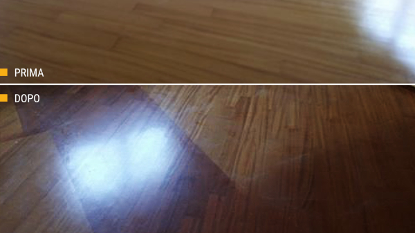 verniciatura con vernici ad acqua di un salone in parquet