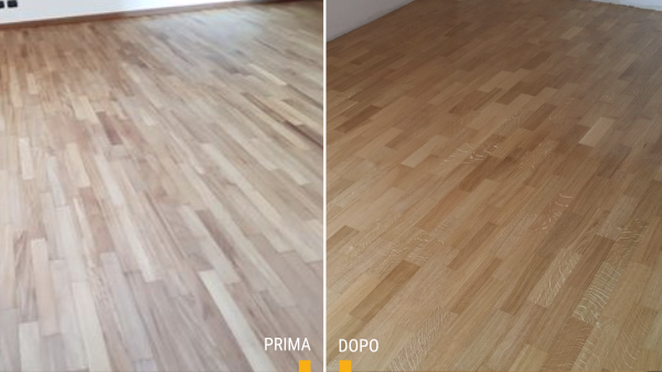 la lucidatura e la stuccatura di una stanza con il pavimento in parquet con vernice ad acqua